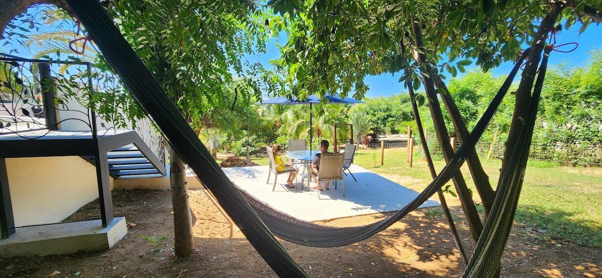 The terrace and loungers at Raíz, Tierra en Armonía