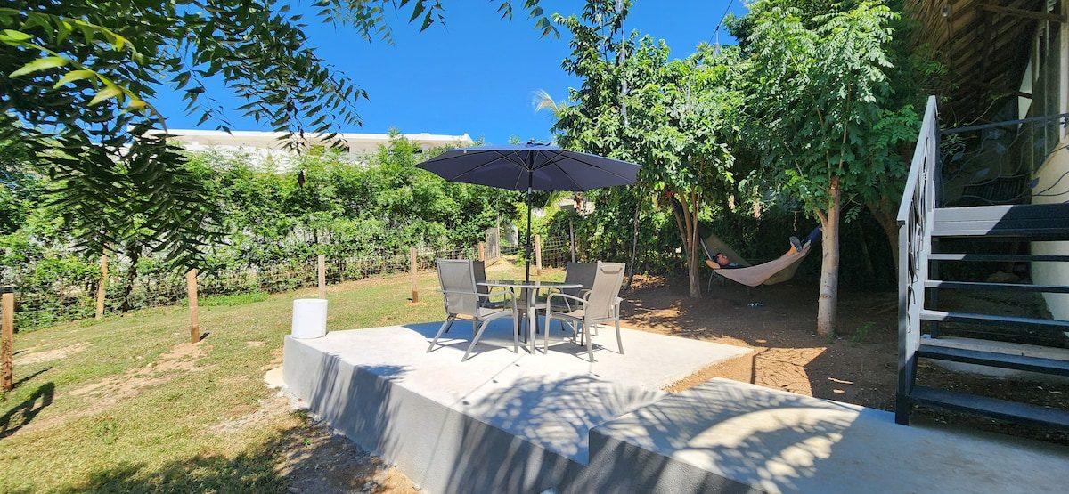The palapa and shaded seating at Raíz, Tierra en Armonía